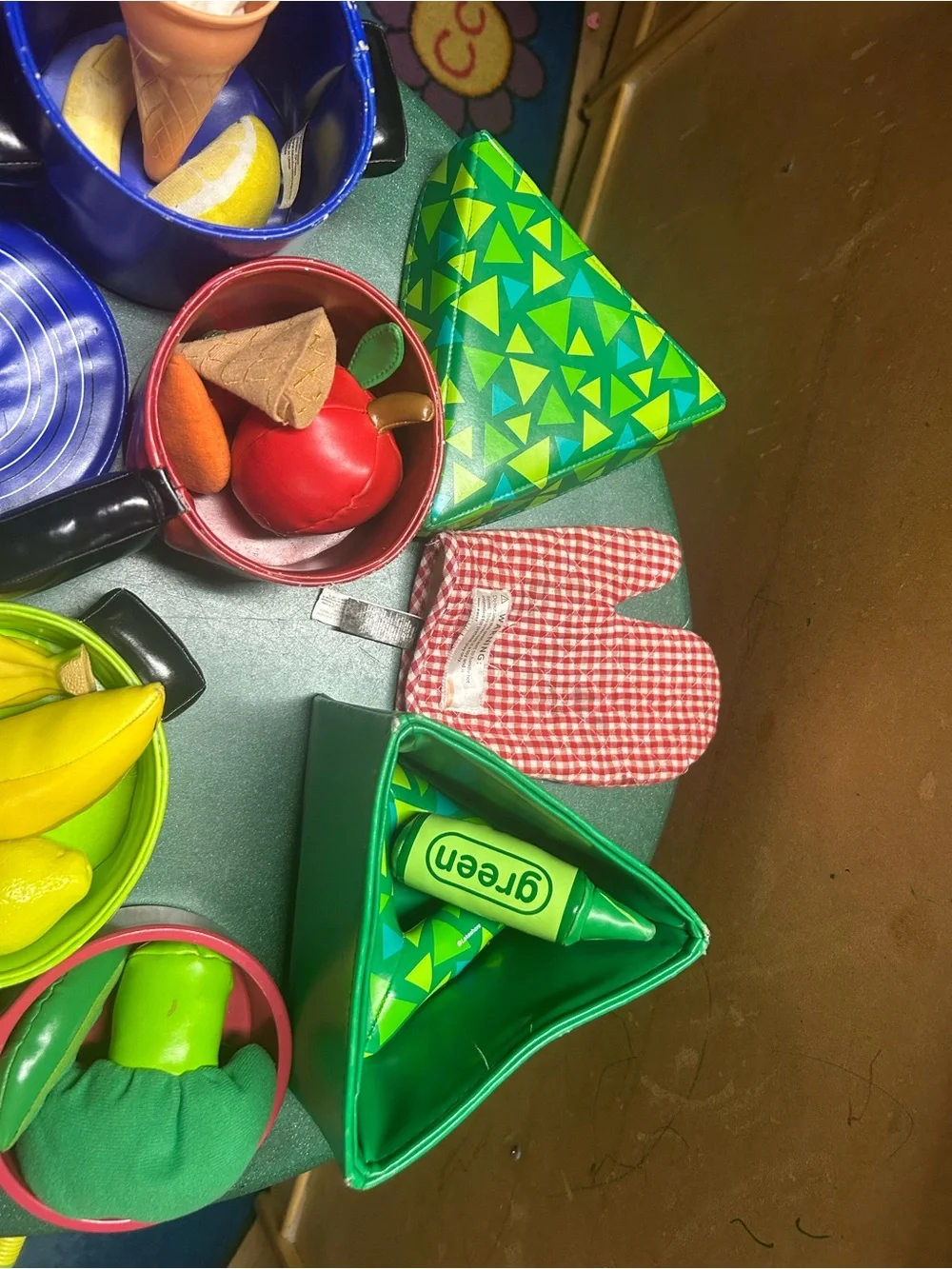 Kitchen play- colorful pans, food and wooden mixer